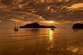 Boats in sunset after the mountain Royalty Free Stock Photo