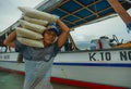 Boats supply 24/7 all kind of stuff to compensate the lack of resources of the island. Here the crew unloading rice