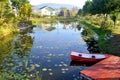 Boats, swamps and houses. Royalty Free Stock Photo