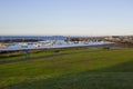 Boats on their moorings beside Cockle Island in the natural tidal harbour at Groomsport in Co Down,Northern Ireland with Belfast Royalty Free Stock Photo