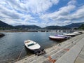 Boats tied to a dock in Como, Italy Royalty Free Stock Photo
