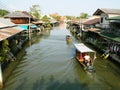 Boats transiting the canal at Amphawa Floating Market