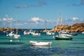Boats and transparent water on Coz-Pors beach in Tregastel, CÃÂ´tes d`Armor, Brittany France Royalty Free Stock Photo