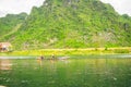 Boats for transporting tourists to Phong Nha cave, Phong Nha - Ke Bang national park, Viet Nam. Royalty Free Stock Photo