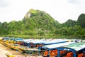 Boats for transporting tourists to Phong Nha cave, Phong Nha - Ke Bang national park, Viet Nam. Royalty Free Stock Photo