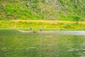 Boats for transporting tourists to Phong Nha cave, Phong Nha - Ke Bang national park, Viet Nam Royalty Free Stock Photo