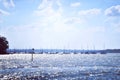 Boats on tropical sunlit silver sea Royalty Free Stock Photo