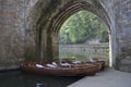 Boats under archway on River Wear, Durham City.