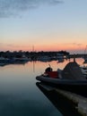 Boats under a red sky reflections Royalty Free Stock Photo