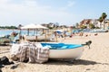 Boats on urban beach in Giardini Naxos town