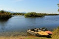 Boats by verge of the river