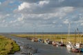 Boats and Waddensea wetlands, Noordpolderzijl, Netherlands Royalty Free Stock Photo