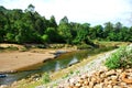 Boats wait outside the entrance of Kong Lor Cave Royalty Free Stock Photo