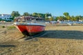 Boats in warm sunset light on the Fisherman`s Beach in Portugal Royalty Free Stock Photo