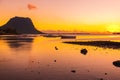 Boats in water at sunset. Le Morn mountain on background in Mauritius Royalty Free Stock Photo