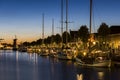 Boats and windmill at the Niuewe Haven in Zierikzee Royalty Free Stock Photo