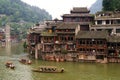 Boats and wooden houses at Phoenix Town, Tuojiang Royalty Free Stock Photo