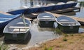 Boats at wooden pier by lake Royalty Free Stock Photo