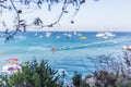 Boats and yachts anchored close to the sea shore in blue lagoon Royalty Free Stock Photo