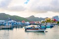 Boats and yachts docked in boatyard on Caribbean island