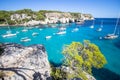 Boats and yachts on Macarella beach, Menorca, Spain