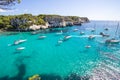 Boats and yachts on Macarella beach, Menorca, Spain