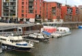 boats and yachts moored on banks Main river modern residential buildings, modern residential buildings german european city Royalty Free Stock Photo