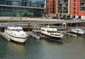 boats and yachts moored on banks Main river modern residential buildings, modern residential buildings german european city Royalty Free Stock Photo