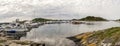 Boats and yachts in small marina harbor near Sokn island camping site