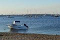 Boats and yatchs in the bay at evening sunset