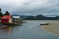 Boatsheds at Papanui inlet on the Otago Peninsula Royalty Free Stock Photo