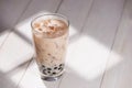 Boba / Bubble tea. Homemade Milk Tea with Pearls on wooden table