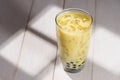 Boba / Bubble tea. Homemade Milk Tea with Pearls on wooden table