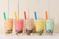 Boba / Bubble tea. Homemade Various Milk Tea with Pearls on wood