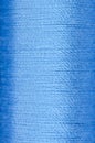 Bobbin of blue thread Royalty Free Stock Photo