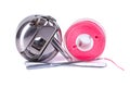 Bobbin case, plastic bobbin and sewing needles Royalty Free Stock Photo