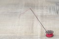 Bobbin needle and red thread Royalty Free Stock Photo