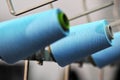 Bobbins with colored thread for industrial textile machines Royalty Free Stock Photo