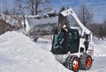 Bobcat skid steer removing snow Royalty Free Stock Photo