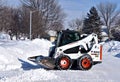 Bobcat skid steer removing snow Royalty Free Stock Photo