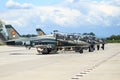 Mechanics attend IAR 99 Soim (Hawk) advanced trainer and light attack airplanes, used as jet trainer of the Romanian Air Force Royalty Free Stock Photo