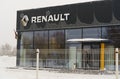 Renault brand logo on the car dealership wall, in winter.