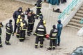 BOBRUISK, BELARUS 27.02.19: Firefighters remove fire equipment after putting out a fire, emergency evacuation