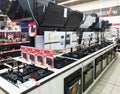 Bobruisk Belarus 19.09.2019: Sale in a household appliance store of gas stoves and cooker hoods, housework