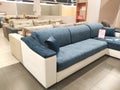 Bobruisk Belarus 19.09.2019: Sale of new modern and comfortable sofas and beds in a furniture store, furniture