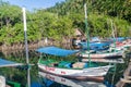 BOCA DE MIEL, CUBA - FEB 4, 2016: Fishing boats anchored at Rio Miel river mouth near Baracoa, Cu Royalty Free Stock Photo