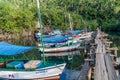 BOCA DE MIEL, CUBA - FEB 4, 2016: Fishing boats anchored at Rio Miel river mouth near Baracoa, Cu Royalty Free Stock Photo