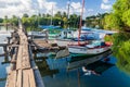 BOCA DE MIEL, CUBA - FEB 4, 2016: Fishing boats anchored at Rio Miel river mouth near Baracoa, Cu Royalty Free Stock Photo