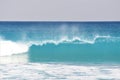 Translucent waves roll toward the Boca Raton Inlet.