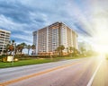 Boca Raton at sunset, Florida. Road,trees and buildings Royalty Free Stock Photo